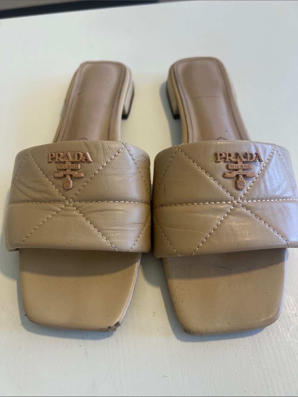 Prada Quilted Beige Leather Slide Mules with Logo Hardware